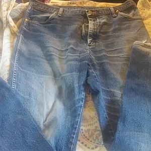 Partly faded wrangler jeans 38x34
